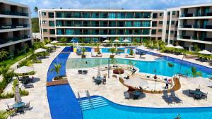 an image of the pool at the resort at Malia Beach in Ipojuca