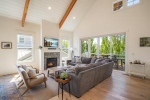 a living room with a couch and a fireplace at Best.Day.Ever. #58 in Chelan