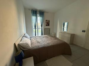 Giường trong phòng chung tại Maison Proietti