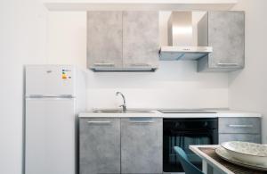 Kuchyň nebo kuchyňský kout v ubytování CIGNO by SALENTO OASIS + 11 fotografií