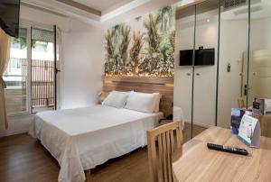 TV a/nebo společenská místnost v ubytování Hotel Estense