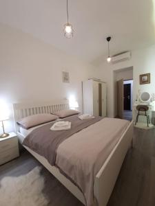 Postel nebo postele na pokoji v ubytování A&Z APARTMENT