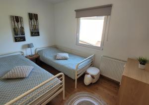 Postel nebo postele na pokoji v ubytování Chalet Julian + 21 fotografií