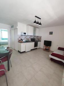 Kuchyň nebo kuchyňský kout v ubytování Apartment Olcsica