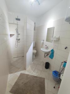 Koupelna v ubytování Apartment Olcsica