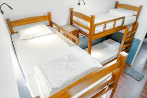 Postel nebo postele na pokoji v ubytování Leo Vishroam