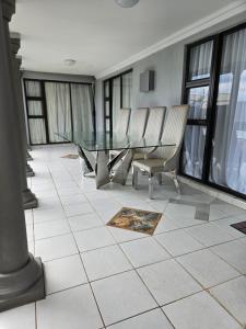 Et opholdsområde på Elitha Boutique Bed and Breakfast