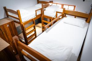 Postel nebo postele na pokoji v ubytování Leo Vishroam