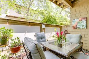 a patio with a wooden table and chairs at Private Patio and Workspace Quiet Sonoma Condo! in Sonoma