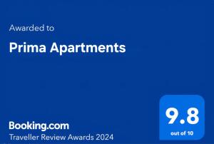 a blue screen with the text awarded to primina apartments at Prima Apartments in Pogradec +63 photos