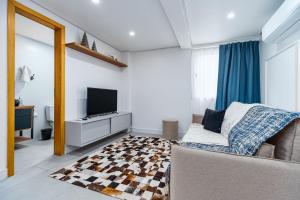 TV a/nebo společenská místnost v ubytování Ap novo no centro de Canela