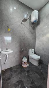 Koupelna v ubytování Sandy Castle Villa 3 Bhk Homestay