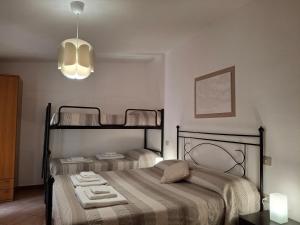 Posteľ alebo postele v izbe v ubytovaní Agriturismo Palas De Serra Country Resort