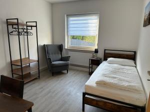 Postel nebo postele na pokoji v ubytování Haus Wolf