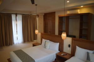 Postel nebo postele na pokoji v ubytování Joanza by ÓOL Hotels