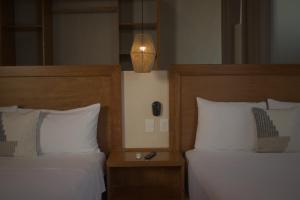 Postel nebo postele na pokoji v ubytování Joanza by ÓOL Hotels