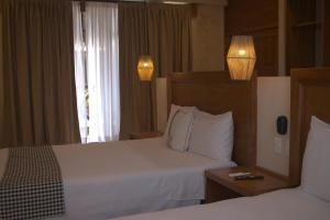Postel nebo postele na pokoji v ubytování Joanza by ÓOL Hotels