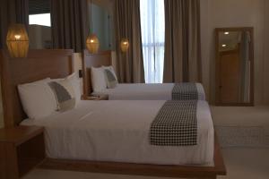 Postel nebo postele na pokoji v ubytování Joanza by ÓOL Hotels