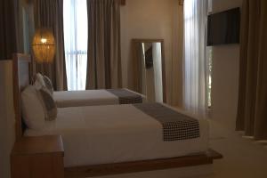 Postel nebo postele na pokoji v ubytování Joanza by ÓOL Hotels