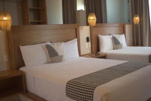 Postel nebo postele na pokoji v ubytování Joanza by ÓOL Hotels