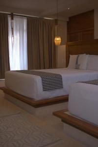 Postel nebo postele na pokoji v ubytování Joanza by ÓOL Hotels