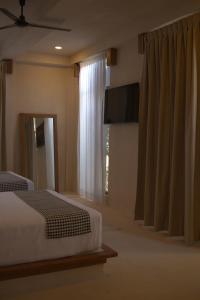 Postel nebo postele na pokoji v ubytování Joanza by ÓOL Hotels