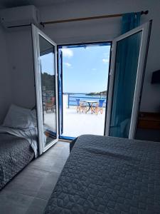 Postel nebo postele na pokoji v ubytování Scirocco Rooms