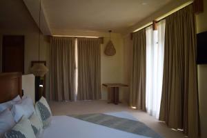 Postel nebo postele na pokoji v ubytování Joanza by ÓOL Hotels