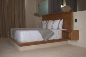 Postel nebo postele na pokoji v ubytování Joanza by ÓOL Hotels