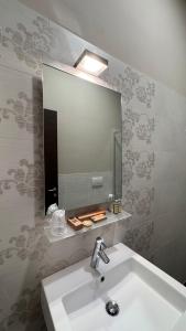 Kúpeľňa v ubytovaní Tropicana Room