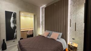 Posteľ alebo postele v izbe v ubytovaní Tropicana Room