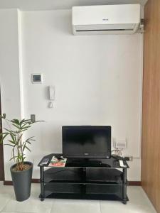 TV a/nebo společenská místnost v ubytování MONOAMBIENTES RESIDENCIALES en TARIJA