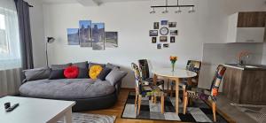 a living room with a couch and a table at Golubica in Golubac