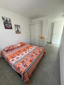 Postel nebo postele na pokoji v ubytování Apartamento Conjunto Aqualina Orange