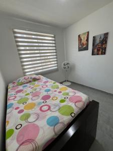 Postel nebo postele na pokoji v ubytování Apartamento Conjunto Aqualina Orange