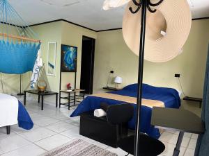 Voodi või voodid majutusasutuse Hotel Azul Coral toas