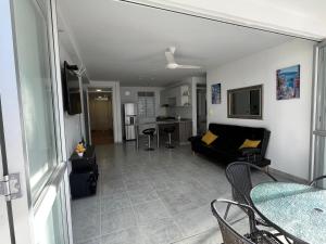 TV a/nebo společenská místnost v ubytování Apartamento Conjunto Aqualina Orange