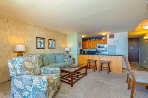 a living room with a couch and a table at SUGAR BEACH RESORT, #326 condo in Kihei