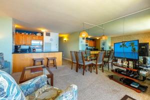 a living room with a dining room and a kitchen at SUGAR BEACH RESORT, #326 condo in Kihei
