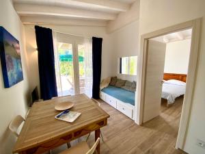 Кровать или кровати в номере Belvedere Residenza Mediterranea +37 фотографий
