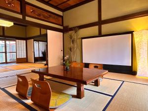 TV a/nebo společenská místnost v ubytování 平田屋 明治の間 -Hirataya Meiji- 父母ケ浜4分