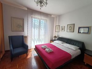 Postel nebo postele na pokoji v ubytování Lily Rose House