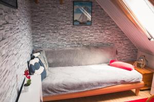 Giường trong phòng chung tại Lütt Matten