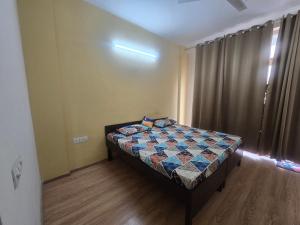 Ένα ή περισσότερα κρεβάτια σε δωμάτιο στο Private Room with Balcony