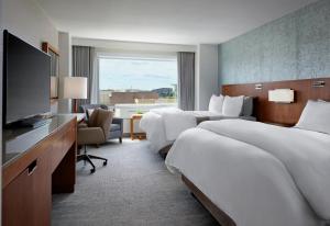 Postel nebo postele na pokoji v ubytování The Westin Austin at The Domain
