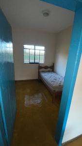 Postel nebo postele na pokoji v ubytování Ribeirão dos mineiros