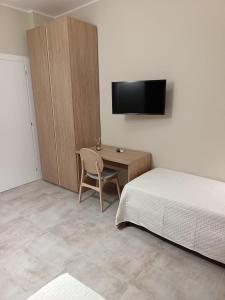 TV a/nebo společenská místnost v ubytování I Colori del Vento