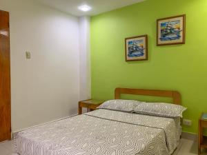 Postel nebo postele na pokoji v ubytování Hotel Veleros Cartagena
