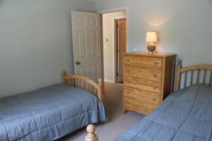 Postel nebo postele na pokoji v ubytování Cape Cod Beach House