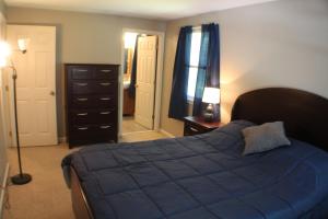 Postel nebo postele na pokoji v ubytování Cape Cod Beach House